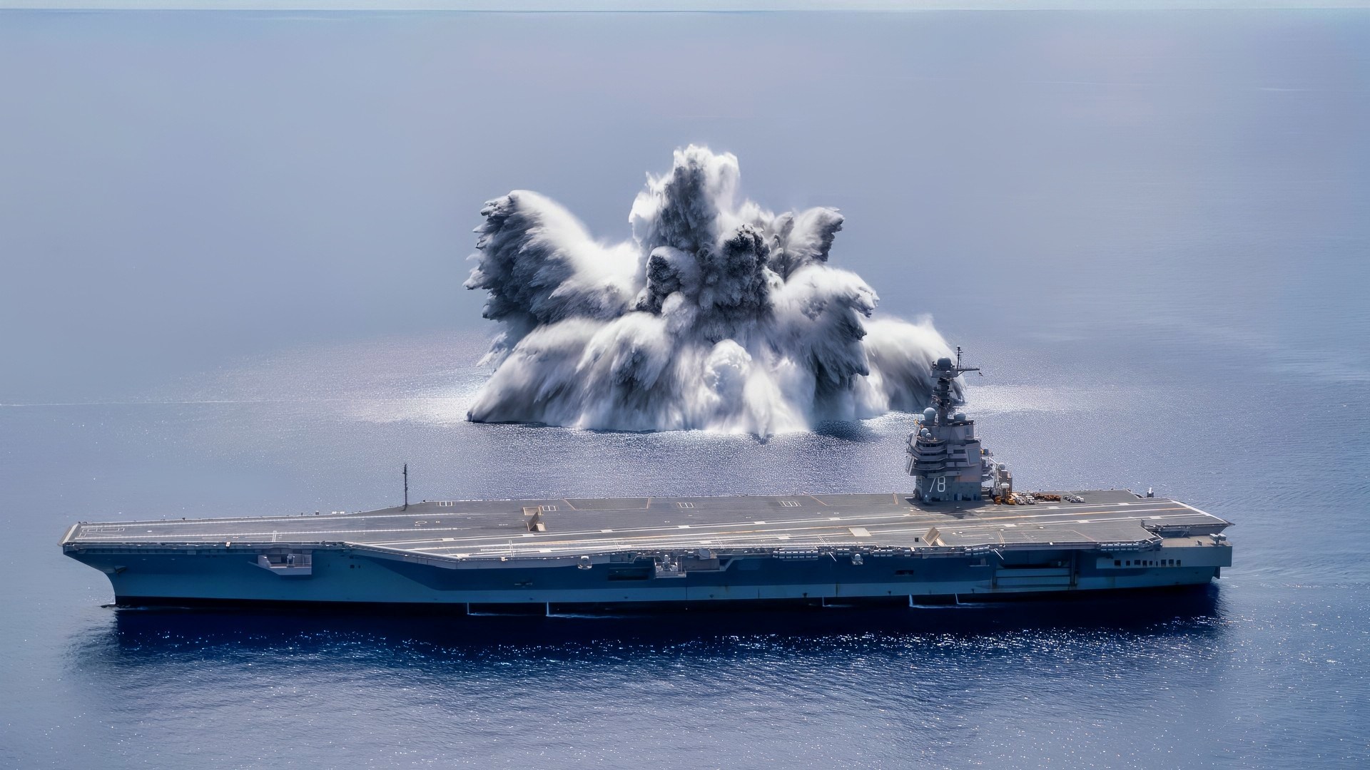The aircraft carrier USS Gerald R. Ford (CVN 78) completes the first scheduled explosive event of Full Ship Shock Trials while underway in the Atlantic Ocean, June 18, 2021. The U.S. Navy conducts shock trials of new ship designs using live explosives to confirm that our warships can continue to meet demanding mission requirements under harsh conditions they might encounter in battle. (U.S. Navy photo by Mass Communication Specialist 3rd Class Riley B. McDowell)