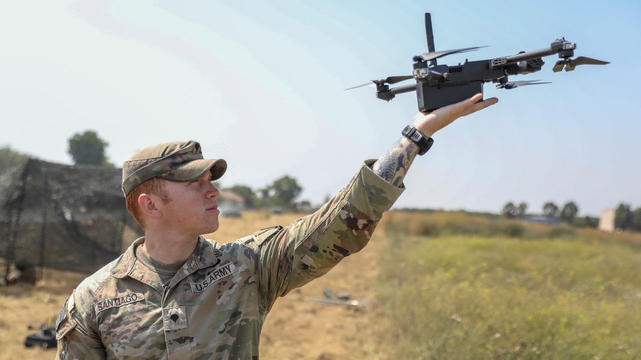 U.S. Army Spc. Harry Santiago IV, assigned to the Multi-Functional Reconnaissance Company, 2nd Brigade Combat Team, 101st Airborne Division (Air Assault), launches a Skydio X2D drone on Mihail Kogalniceanu Air Base, Romania, July 09, 2025. V Corps provides essential support to multinational training and exercises of robust and evolving complexity, scope, scale, rigor, and operational conditions and provides targeted security force assistance alongside national and multinational corps and divisions. (U.S. Army photo by Spc. Breanna Bradford)