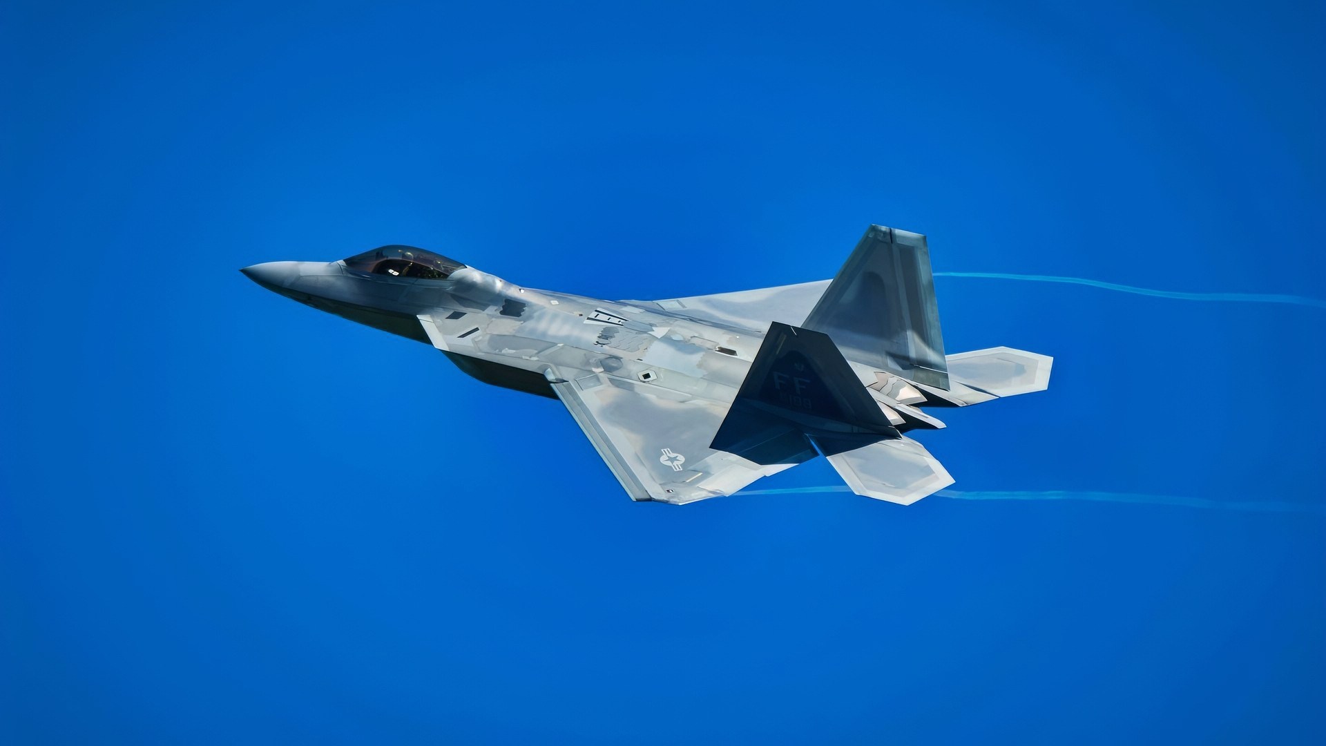 An F-22 Raptor assigned to the 1st Fighter Wing, Joint Base Langley-Eustis, Va., takes off for a training mission during Northern Lightning, a training exercise held annually at Volk Field, Wisc., Aug. 12, 2020. This is the first time the 158th has participated in the exercise with the F-35s, which sees them working with F-22 Raptors assigned to the 1st Fighter Wing, Joint Base Langley-Eustis, Va., F/A-18E Super Hornets assigned to VFA-151, Naval Air Station Lemoore, Calif., F-16 Falcons assigned to the Wisconsin National Guard, as well as T-38 Talons and L-159Es from Draken International acting as aggressor aircrafts conducting simulated combat missions in a joint-service environment. (U.S. Air National Guard photo by Airman 1st Class Jana Somero)