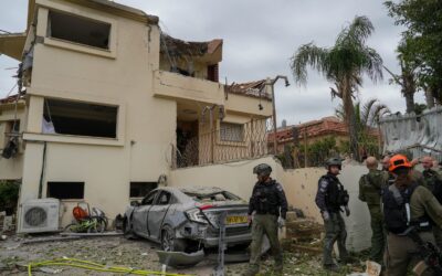 Hezbollah fires 130 rockets at northern Israel, wounding four as strikes hit Lebanon