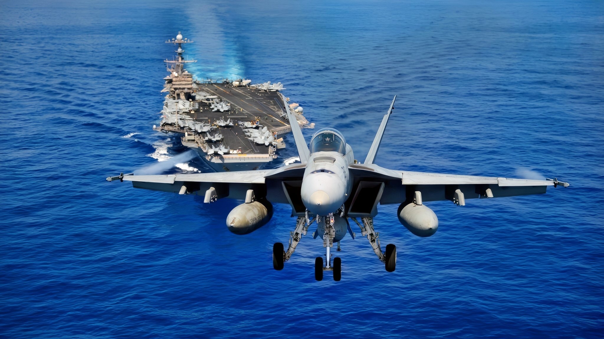 A U.S. Navy F/A-18E Super Hornet aircraft assigned to Strike Fighter Squadron (VFA) 14 participates in an air power demonstration near the aircraft carrier USS John C. Stennis (CVN 74) April 24, 2013, in the Pacific Ocean. The John C. Stennis Carrier Strike Group was returning from an eight-month deployment to the U.S. 5th Fleet and U.S. 7th Fleet areas of responsibility. (U.S. Navy photo by Mass Communication Specialist Seaman Apprentice Ignacio D. Perez/Released)