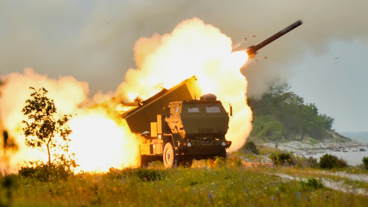 An Estonian Defense Forces M142 High Mobility Artillery Rocket System (HIMARS) fires a training rocket during a live-fire exercise in Undva, Estonia, July 11, 2025. U.S. Army elements from Bravo Battery, 1st Battalion, 14th Field Artillery Regiment, 75th Field Artillery Brigade, supporting Task Force Voit, assisted in the training process. The task force was originally formed in 2023 to support the Estonian Defense Forces in the creation of a HIMARS unit. Task Force Voit works closely with the Estonian Armed Forces, sharing critical defense strategies, training, and military readiness support. The presence of U.S. troops in the region serves as a cornerstone of NATO’s commitment to security in the Baltic region. The task force provides combat-credible forces to V Corps, America’s only forward-deployed corps in Europe. (U.S. Army photo by Staff Sgt. Rose Di Trolio)