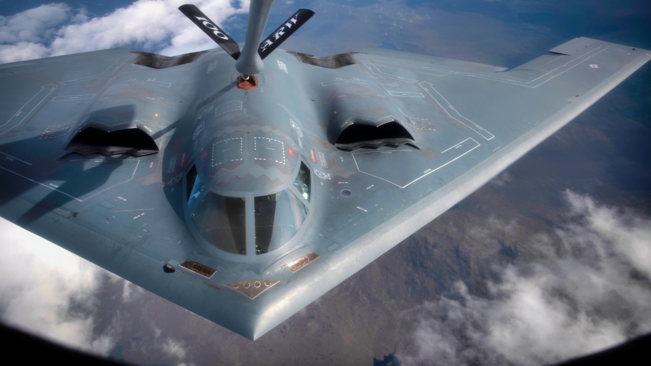 A U.S. Air Force B-2 Spirit assigned to the 509th Bomb Wing, Whiteman Air Force Base, Missouri, is refueled by a KC-135 Stratotanker assigned to the 351st Aerial Refueling Squadron, RAF Mildenhall, during the Bomber Task Force training exercise over England, Aug. 29, 2019. Training with partners, allied nations and other U.S. Air Force units contributes to global readiness and enables the strengthening of enduring and strategic relationships throughout the theater. (U.S. Air Force photo by Tech. Sgt. Emerson Nuñez)