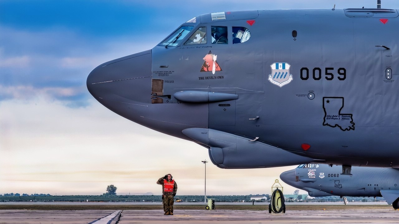 U.S. Airmen assigned to the 96th Expeditionary Bomber Generation Squadron salute the crew of a B-52H Stratofortress aircraft as they begin to taxi at Morón Air Base, Spain, Nov. 19, 2025, as part of Bomber Task Force Europe 26-1. The ability of U.S. forces and equipment to operate in conjunction with those of our Allies and partners is critical to bolstering an extended network of capabilities to decisively meet the challenges of today and tomorrow. (U.S. Air Force photo by Tech. Sgt. Codie Trimble)