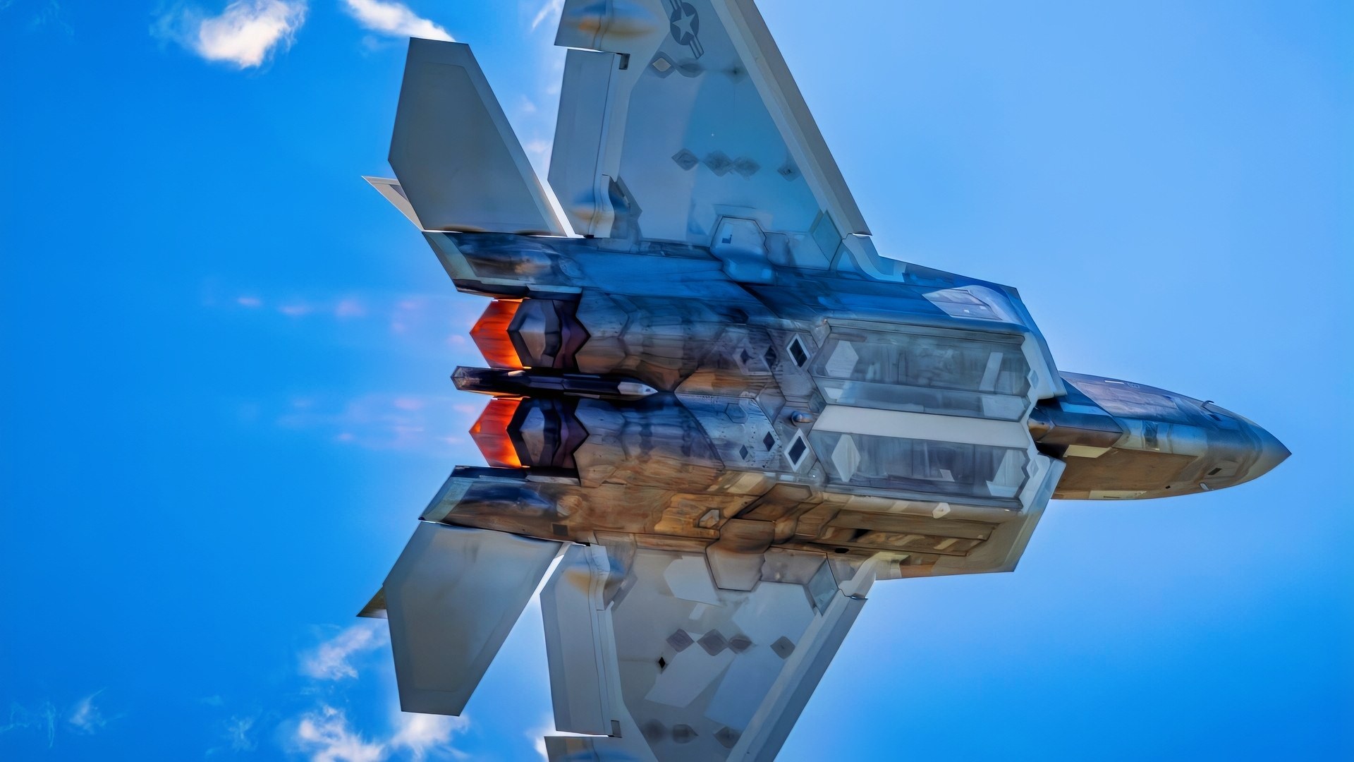 An F-22 Raptor performs an aerial demonstration at Naval Air Station Oceana, Virginia, Sept. 19, 2025. Rapid changes in angle of attack create visible vapor around the aircraft, providing a clear view of its aerodynamic performance. This demonstration highlights the F-22’s advanced maneuvering capabilities, showcasing its speed, agility, and thrust-vectoring performance. (U.S. Air Force photo by Staff Sgt. Lauren Cobin)