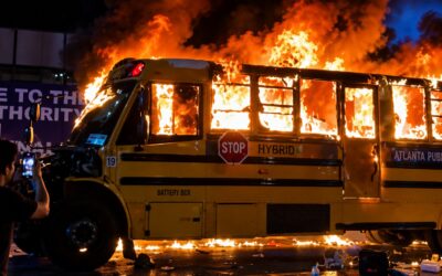 60+ Arrests, Nearly A Dozen Injured Police Officers & Bus Torched Amid NYC Madness After Knicks Win Championship