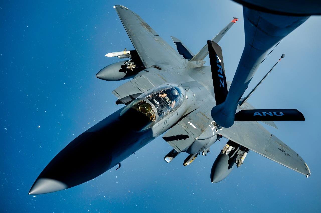 A U.S. Air Force KC-135 Stratotanker offloads fuel to U.S. Air Force F-15 Strike Eagles over the U.S. Central Command area of responsibility, April 11, 2025. The F-15E is deployed to the CENTCOM AOR to reinforce regional stability and deter aggression from violent extremist organizations.. (U.S. Air Force photo by Senior Airman Keegan Putman)