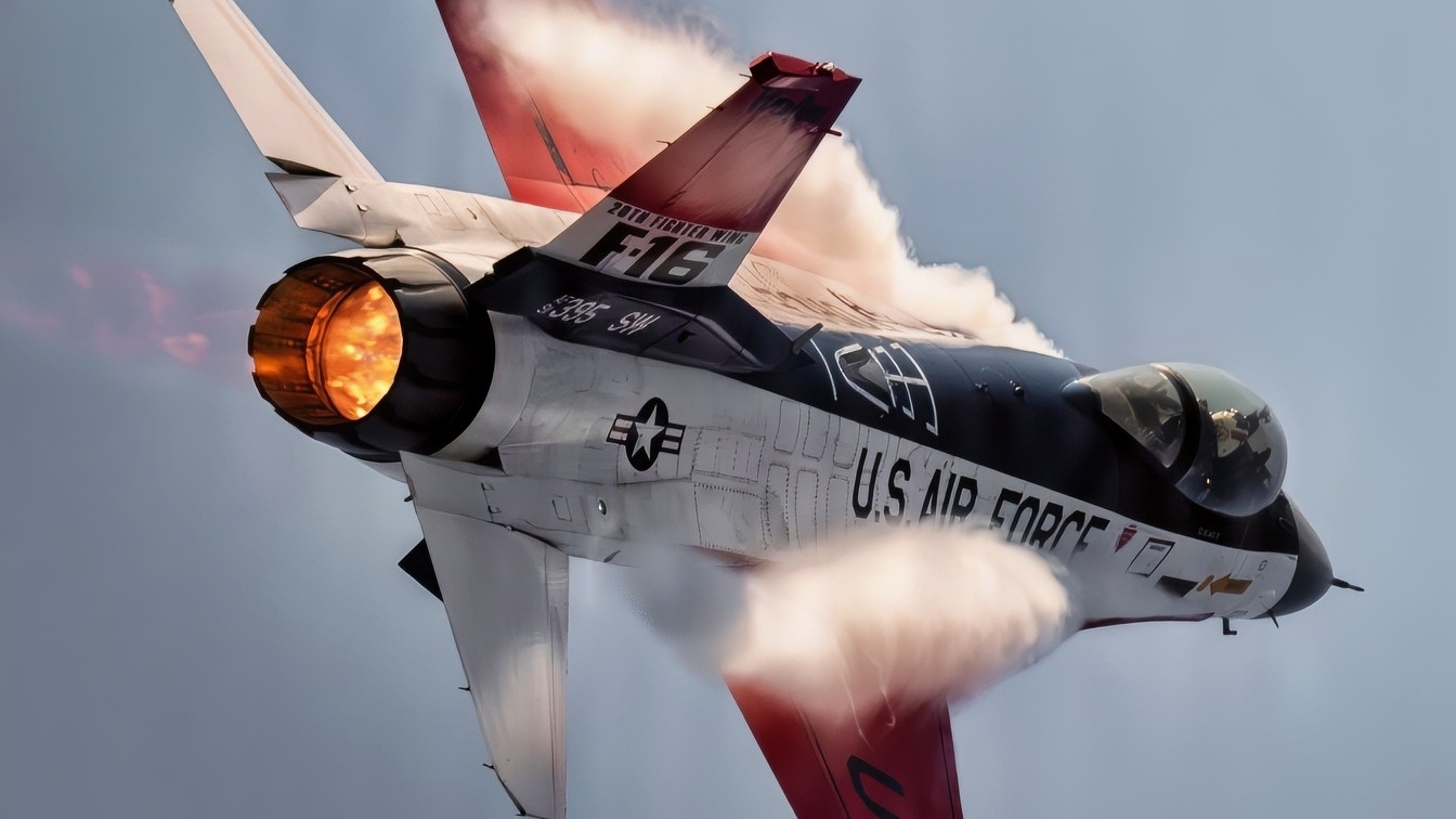 U.S. Air Force Maj. Taylor “FEMA” Hiester, F-16 Viper Demonstration Team commander and pilot, performs aerial maneuvers in a U.S. Air Force F-16C Fighting Falcon during AirVenture at Oshkosh, Wisconsin, July 24, 2026. The F-16 is a multi-role fighter capable of air-to-air and air-to-ground combat operations. (U.S. Air Force photo by Staff Sgt. Steven Cardo)